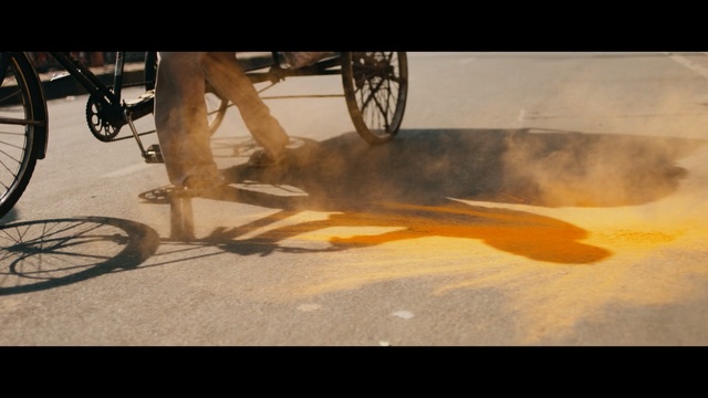 Video Reference: yellow, mode of transport, bicycle, shadow, vehicle, sunlight, wood, sports equipment, sky, recreation