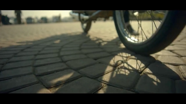 Video Reference: tire, automotive tire, mode of transport, wheel, spoke, vehicle, automotive wheel system, morning, tread, bicycle wheel, Person