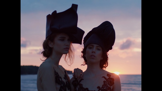 Video Reference: photograph, fun, sky, vacation, girl, sea, human, smile, headgear, summer, Person