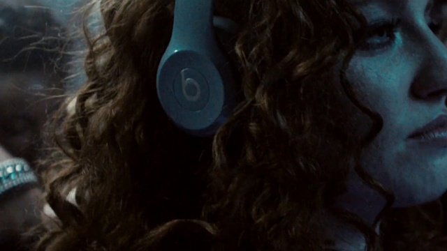 Video Reference: Hair, Face, Blue, Audio equipment, Beauty, Lip, Long hair, Brown, Hairstyle, Eye