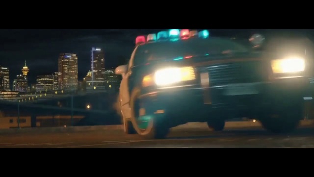 Video Reference: Land vehicle, Vehicle, Car, Mode of transport, Police car, Night, Ford crown victoria, City, Metropolitan area, Automotive exterior