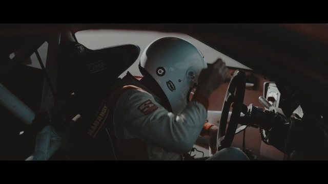 Video Reference: mode of transport, screenshot, personal protective equipment, car, darkness, space, helmet