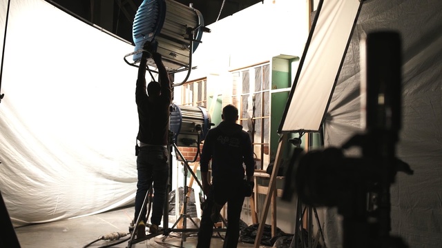 Video Reference: audio, microphone, film studio, filmmaking, building, studio, Person