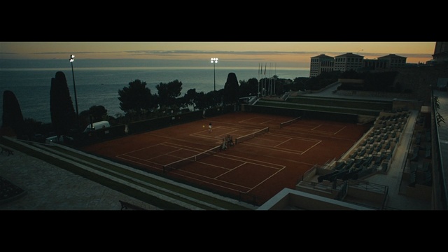 Video Reference: Sport venue, Tennis court, Sky, Light, Tennis, Stadium, Line, Architecture, Photography, Arena, Person