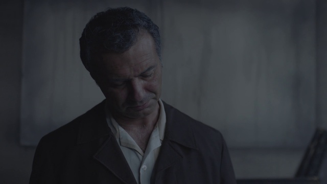 Video Reference: Face, Chin, Human, Photography, Suit, Mouth, Darkness, Portrait, Black-and-white, White-collar worker