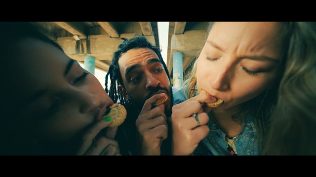 Video Reference: Nose, Mouth, Human, Eye, Fun, Photography, Hand, Scene, Screenshot, Flesh, Person, Indoor, Man, Teeth, Talking, Face, Brushing, Holding, Woman, Toothbrush, Phone, Young, Food, Hair, Girl, Wearing, People, Standing, White, Human face, Mirror, Crowd