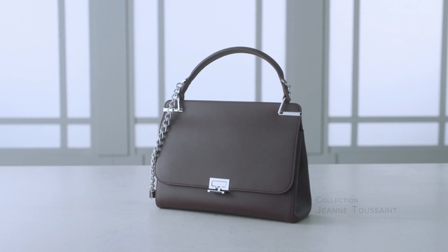 Video Reference: bag, handbag, white, shoulder bag, fashion accessory, product, product, leather, brand, metal, Person