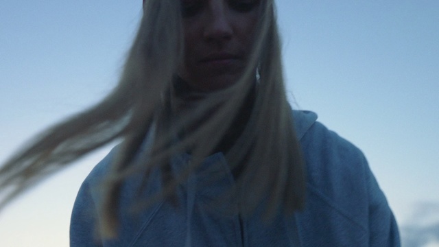 Video Reference: Hair, Blue, Blond, Neck, Lip, Outerwear, Shoulder, Long hair, Mouth, Photography