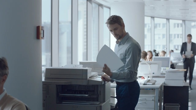 Video Reference: Standing, Room, Desk, Furniture, Filing cabinet, Photocopier, Office, Kitchen, Interior design, Window