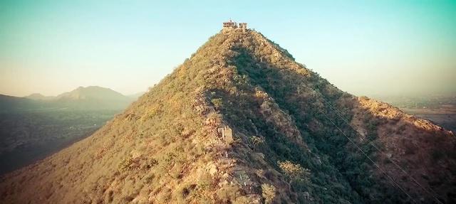 Video Reference: Mountainous landforms, Hill, Mountain, Ridge, Historic site, Rock, Landscape, Unesco world heritage site, Summit, Volcanic plug