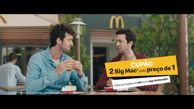 Video Reference: Conversation, Adaptation, Fun, Movie, Photo caption, Advertising, Media, Font, Screenshot, Photography, Person, Man, Holding, Looking, Front, Sitting, Table, Food, Standing, Woman, Computer, People, Screen, Laptop, Text, Human face, Clothing