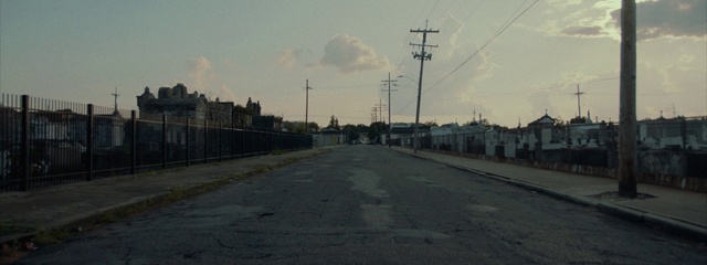 Video Reference: Road, Overhead power line, Residential area, Atmospheric phenomenon, Town, Asphalt, Urban area, Thoroughfare, Street, Infrastructure