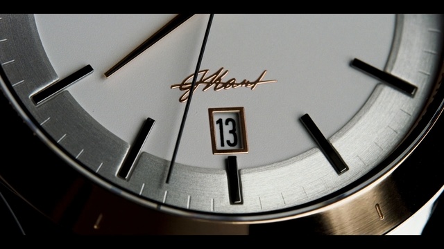Video Reference: watch, close up, clock, font, metal, wheel, brand, circle