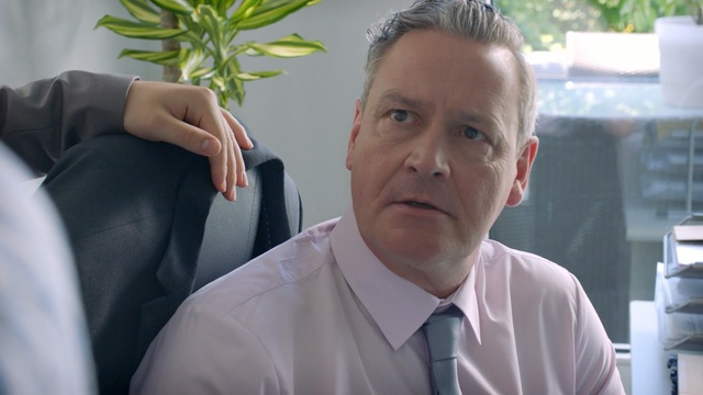 Video Reference: Male, Forehead, Businessperson, Suit, White-collar worker, Neck, Gesture, Ear, Tie, Formal wear, Person