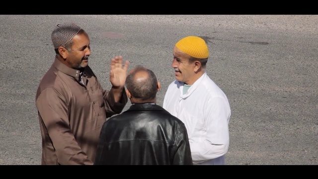 Video Reference: man, human, headgear, conversation, Person