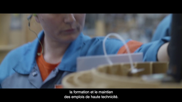 Video Reference: Human, Auto part, Automotive wheel system, Wheel, Mouth, Machine, Photo caption, Smile, Art