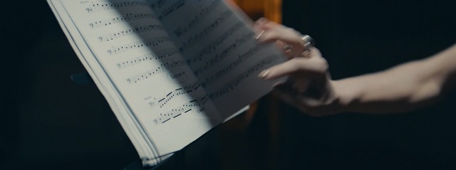 Video Reference: hand, music, darkness, font, Person