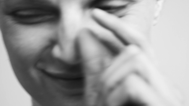 Video Reference: Face, Nose, Skin, White, Photograph, Facial expression, Black-and-white, Head, Forehead, Eyebrow
