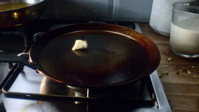 Video Reference: Cookware and bakeware, Wok, Food, Dish, Cuisine, Frying pan, Ingredient, Recipe, Gravy, Sauté pan, Indoor, Pan, Pot, Stove, Sitting, Table, Cooking, Kitchen, Metal, Oven, Cooked, Wooden, Tray, Large, Steel, Black, Bowl, Pizza, Stainless, Hot, Plate, Kitchenware, Ceramic, Fresh, Kitchen appliance