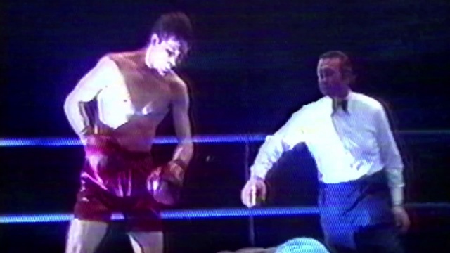 Video Reference: Sport venue, Entertainment, Performance, Stage, Professional wrestling, Contact sport, Barechested, Performing arts, Event, Combat sport, Person