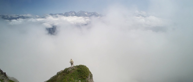 Video Reference: Mountainous landforms, Mountain, Sky, Atmospheric phenomenon, Mountain range, Cloud, Hill station, Ridge, Alps, Mist