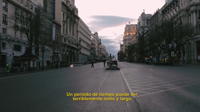 Video Reference: road, lane, town, street, sky, infrastructure, urban area, neighbourhood, city, car