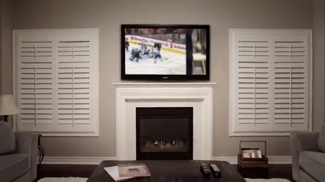 Video Reference: room, interior design, living room, hearth, wall, fireplace, home, furniture, window, multimedia