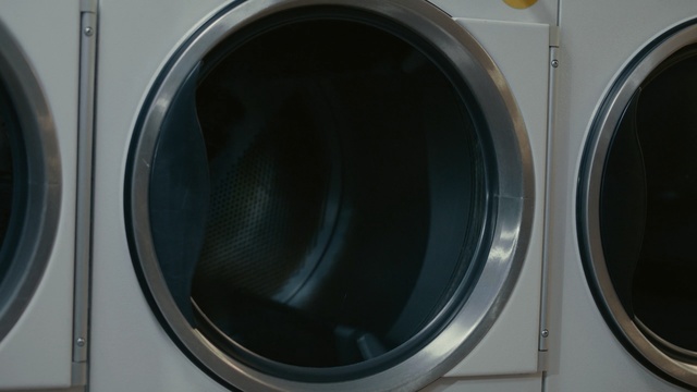 Video Reference: washing machine, product, clothes dryer, major appliance, laundry, Person