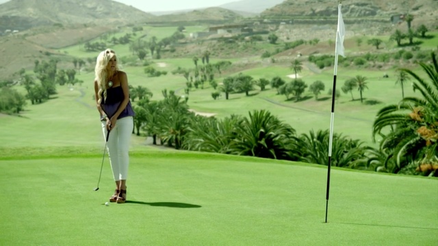 Video Reference: golf, golf course, golfer, golf club, leisure, golf equipment, grass, hickory golf, sport venue, pitch and putt, Person