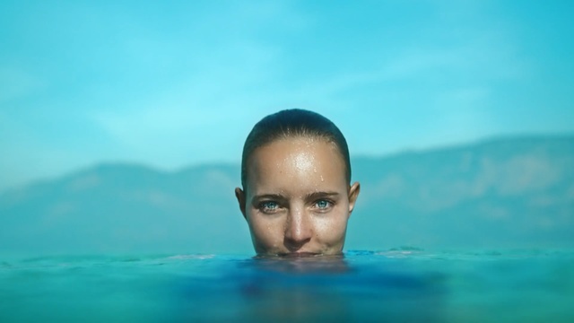 Video Reference: Face, Blue, Water, Head, Skin, Forehead, Chin, Sky, Aqua, Fun, Person