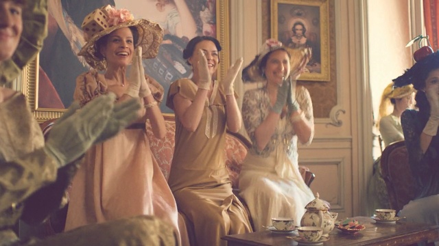 Video Reference: Fun, Event, Art, Person, Indoor, Standing, Photo, Man, Group, Front, People, Posing, Holding, Girl, Young, Dressed, Woman, Room, Large, White, Kitchen, Phone, Wedding dress, Bride, Dress, Clothing, Human face, Smile, Wedding, Fashion accessory, Dance, Crowd