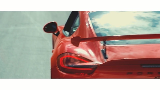 Video Reference: red, car, motor vehicle, yellow, automotive design, mode of transport, automotive lighting, orange, vehicle door, automotive exterior