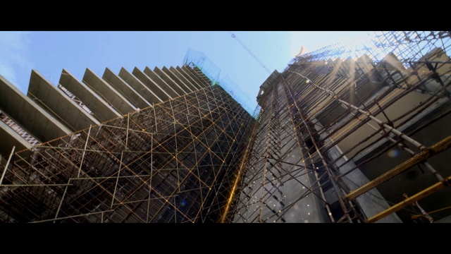 Video Reference: Architecture, Sky, Urban area, Skyscraper, Building, Material property, City, Scaffolding, Tower block, Commercial building