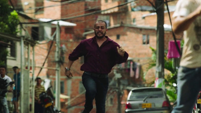 Video Reference: Photograph, Snapshot, Street, Standing, Urban area, Town, Pedestrian, Fun, Neighbourhood, Human