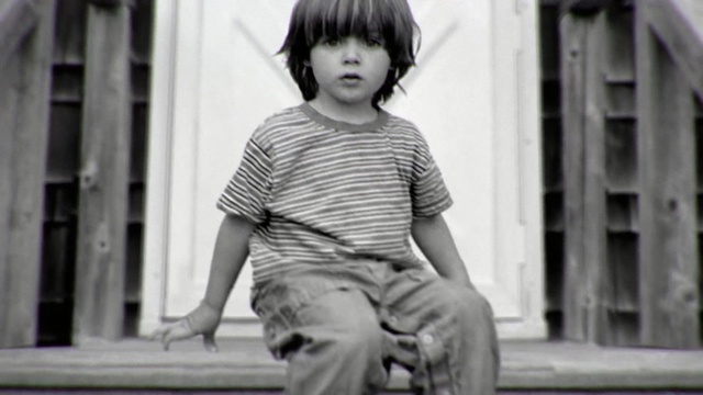 Video Reference: Photograph, Black-and-white, Sitting, Standing, Snapshot, Child, Hairstyle, Monochrome photography, Human, Monochrome, Person