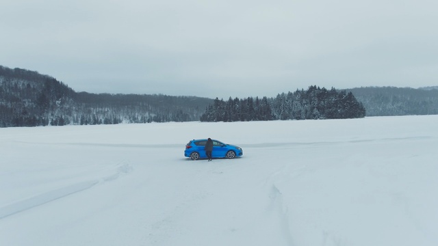 Video Reference: snow, winter, road, freezing, ice, car, geological phenomenon, sky, automotive exterior, vehicle