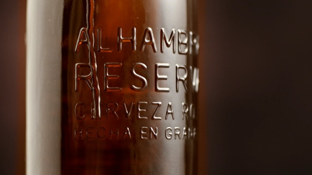 Video Reference: text, glass bottle, bottle, font, drink, wood, distilled beverage, whisky, liqueur