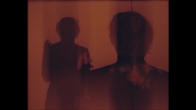 Video Reference: black, photograph, darkness, snapshot, scene, girl, human, screenshot, mouth, muscle