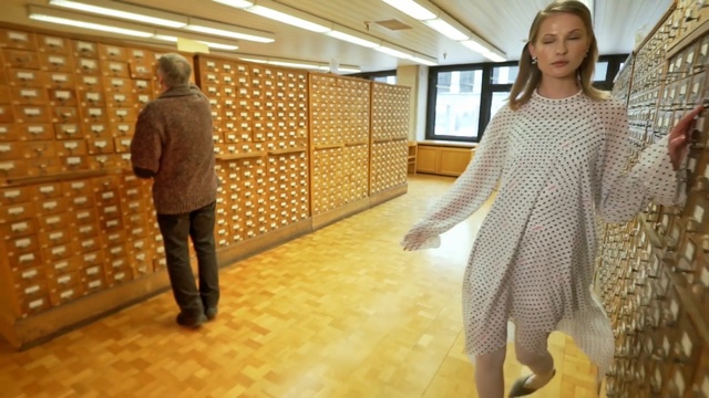 Video Reference: floor, flooring, furniture, pattern, Person