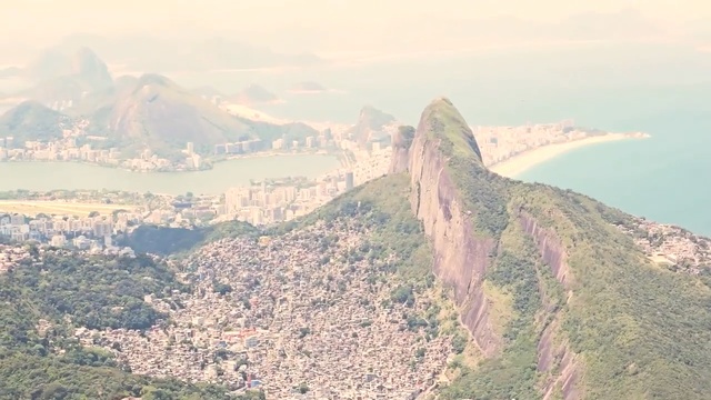 Video Reference: Mountainous landforms, Mountain, Landmark, Mountain range, Atmospheric phenomenon, Hill, Hill station, Sky, Ridge, Aerial photography