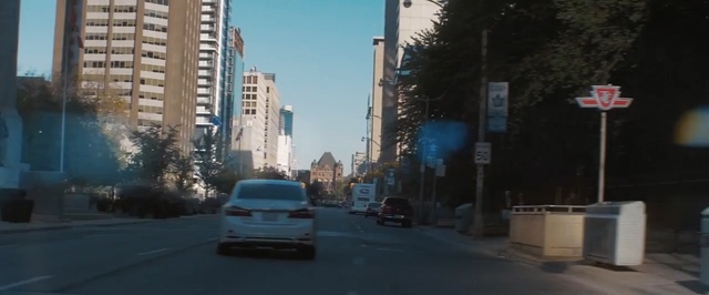 Video Reference: metropolitan area, urban area, car, city, metropolis, skyscraper, downtown, mode of transport, lane, sky