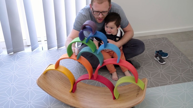 Video Reference: play, fun, toy, toddler, chair, product, furniture, child, shoe, table, Person