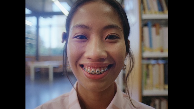 Video Reference: Face, Tooth, Smile, Facial expression, Eyebrow, Forehead, Jaw, Skin, Head, Nose, Person