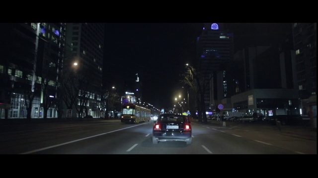 Video Reference: Metropolitan area, Night, Urban area, Metropolis, Street light, Lane, City, Black, Mode of transport, Darkness