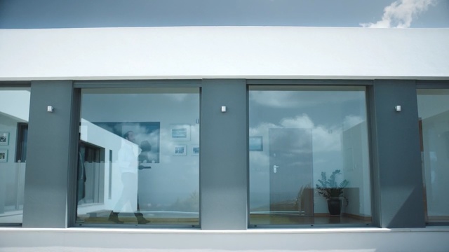 Video Reference: architecture, glass, window, door, house, facade, home door, Person
