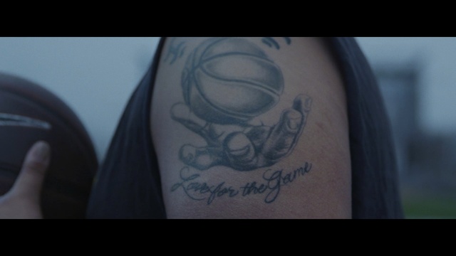 Video Reference: Tattoo, Shoulder, Arm, Font, Joint, Personal protective equipment, Temporary tattoo, Headgear, Flesh, Mask