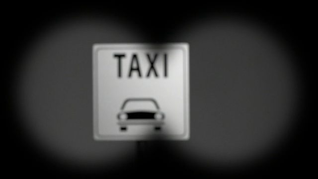 Video Reference: White, Black, Product, Text, Font, Black-and-white, Monochrome, Logo, Photography, Monochrome photography, Person, Indoor, Thing, Sign, Monitor, Dark, Mounted, Sitting, Front, Hand, Screen, Close, Clock, Man, Blurry, Screenshot, Jack