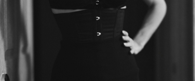 Video Reference: Clothing, Black, Dress, Little black dress, Waist, Fashion, Formal wear, Photography, Sleeve, Cocktail dress