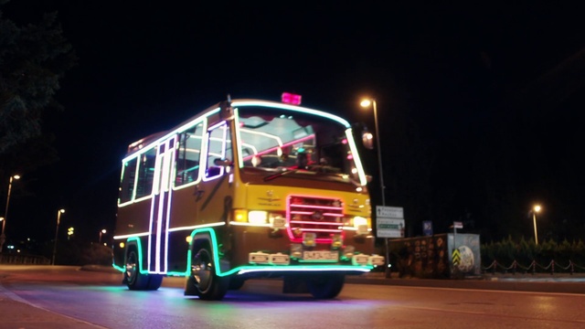Video Reference: Transport, Mode of transport, Night, Lighting, Light, Motor vehicle, Vehicle, Neon, Commercial vehicle, Truck