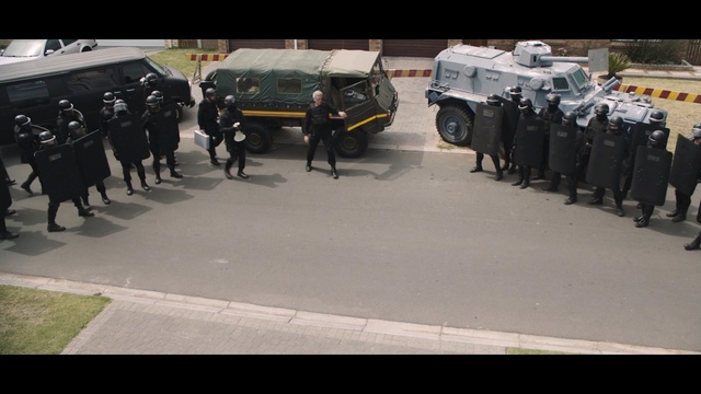 Video Reference: Motor vehicle, Military, Mode of transport, Police, Troop, Vehicle, Marching, Security, Official, Swat